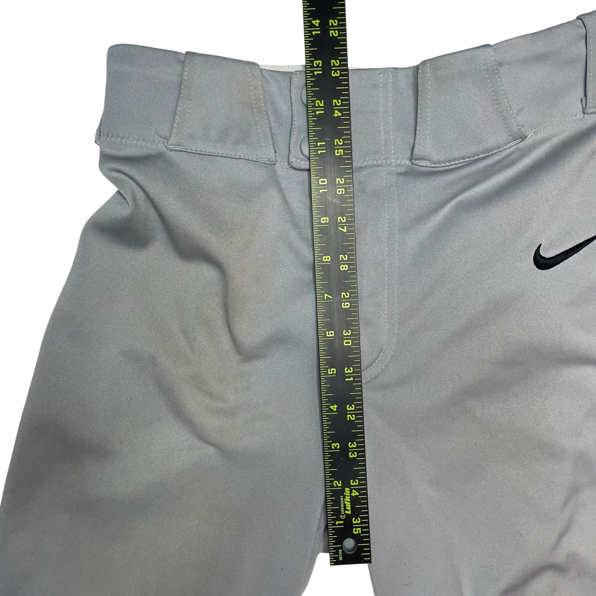 Nike Team Gray Baseball Pants Youth Small Swoosh Logo
Description:
Nike Team baseball pants in light gray, size Youth Small. Features snap closure, zip fly, belt loops, and embroidered black Nike swoosh on front. Durable polyester material built for game 8
