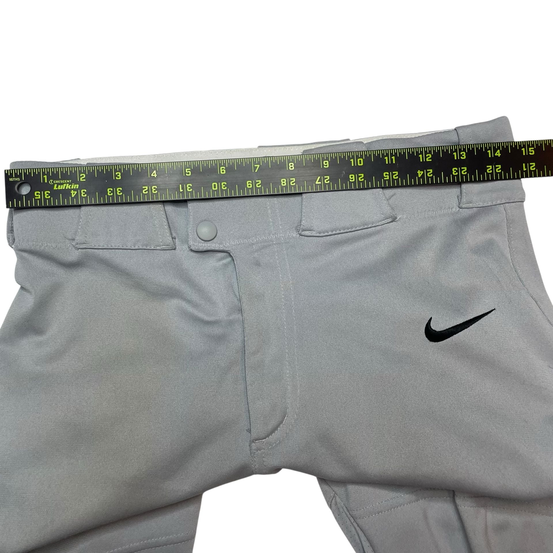 Nike Team Gray Baseball Pants Youth Small Swoosh Logo
Description:
Nike Team baseball pants in light gray, size Youth Small. Features snap closure, zip fly, belt loops, and embroidered black Nike swoosh on front. Durable polyester material built for game 9