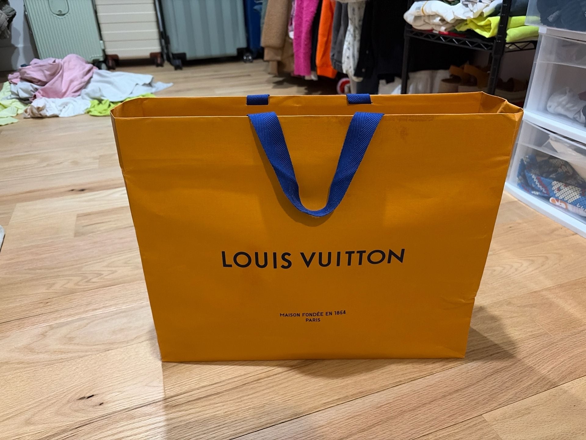 Authentic Louis Vuitton Signature Imperial Saffron Paper Shopping Bag with Blue Ribbon Handles 1