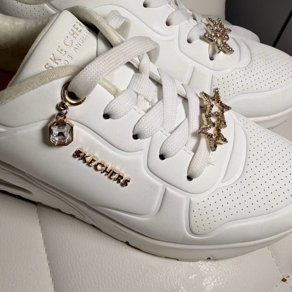 Skechers Baskets Uno Gen1 pour fille, Blanc/doré, 1 tout-petit : : Mode, CA