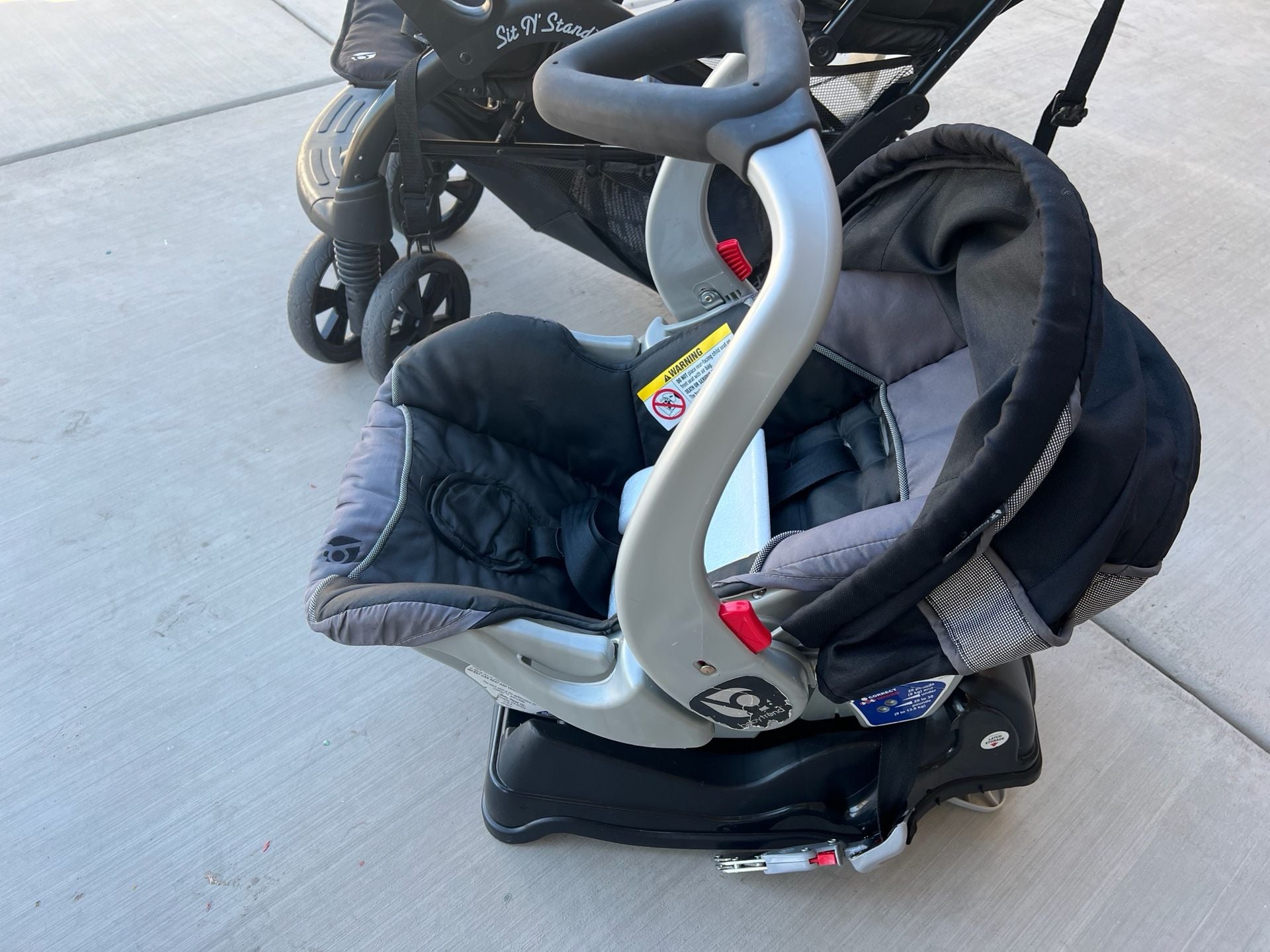 Baby Trend Sit N' Stand Double Stroller with Infant Car Seat and Base Travel System 12