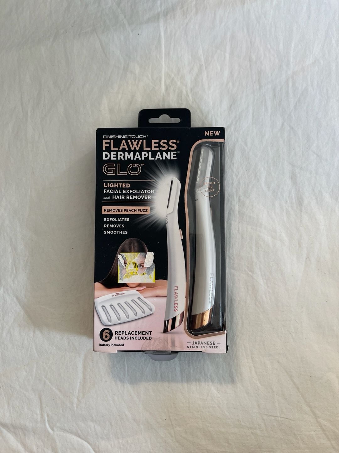 Finishing Touch Flawless Dermaplane Glo Lighted Facial Exfoliator and Hair Remover with 6 Replacement Heads 1