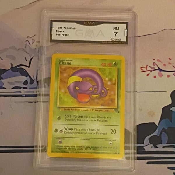 1999 Pokemon Fossil #46 Ekans GMA 7 NM