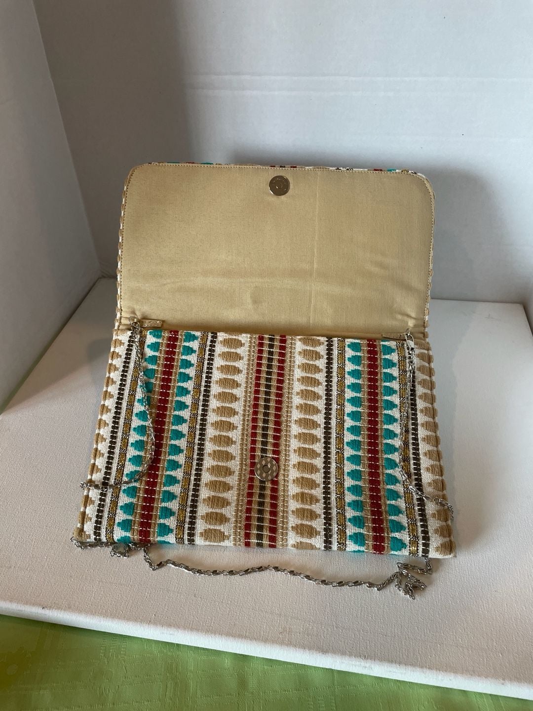 Charade Boho Embroidered Woven Clutch with Pom Poms and Chain Strap. 6