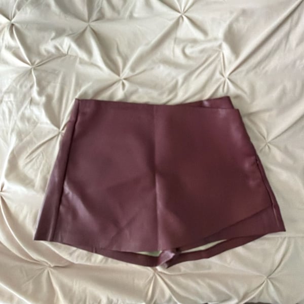 Shop Priceless Faux Leather Wrap Skort in Burgundy