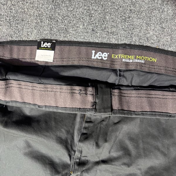 Lee Men's Big & Tall Extreme Motion Flat Front Regular Straight Pant Black 52W X 30L