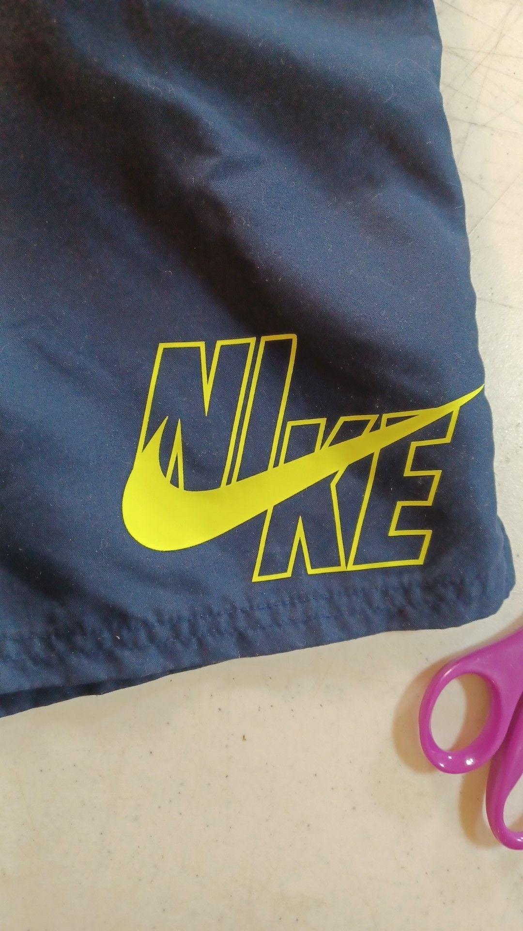 Nike Men's Logo 9 Inch Volley Swim Trunk Shorts in Midnight Navy and Volt medium 8