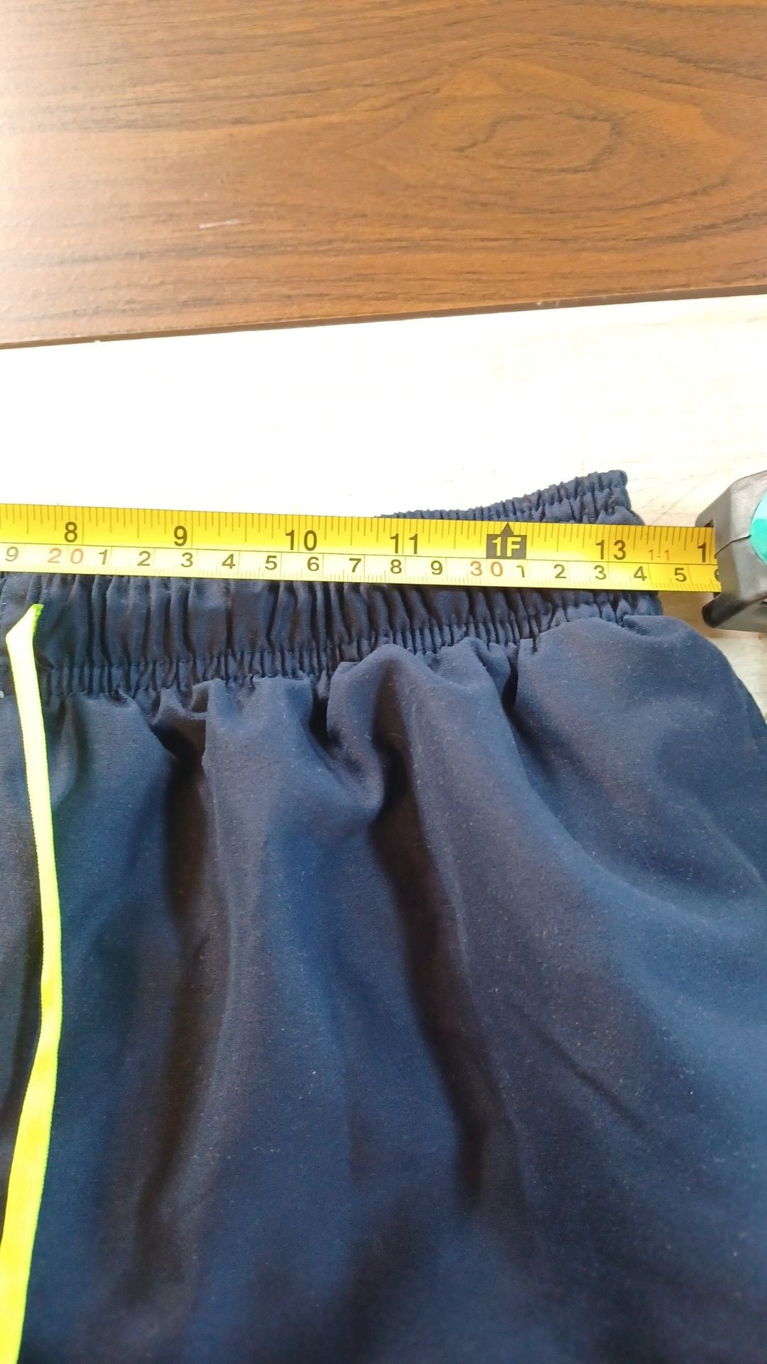 Nike Men's Logo 9 Inch Volley Swim Trunk Shorts in Midnight Navy and Volt medium 9
