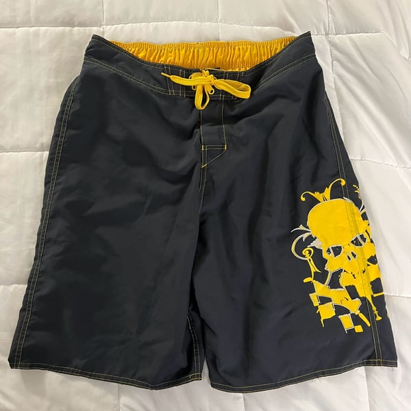 Vintage 2009 Joe Boxer Men's Medium Black and Yellow Skull Graphic Swim Trunks 