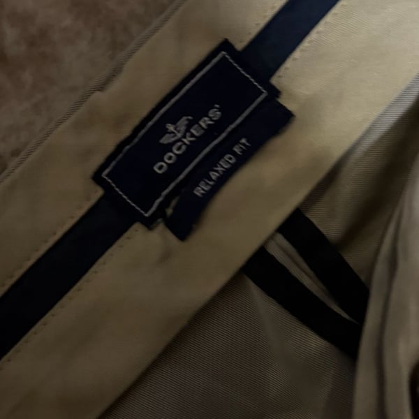 Dockers Relaxed Fit Pleated Khaki Dress Pants in Grey Tan