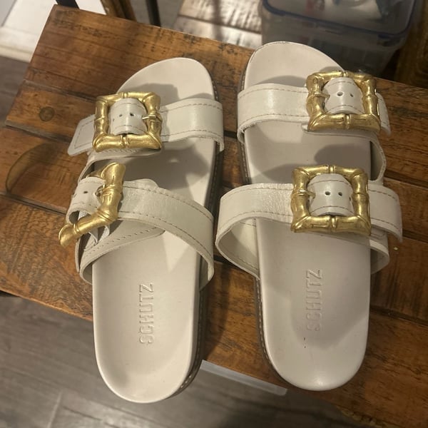 Schutz Enola Sporty Leather Slide Sandals with Gold Bamboo Buckles in Pearl