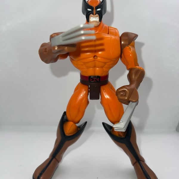 Vintage 1998 Toy Biz Marvel Shape Shifters Shadow Wolverine Action Figure - Orange Variant
