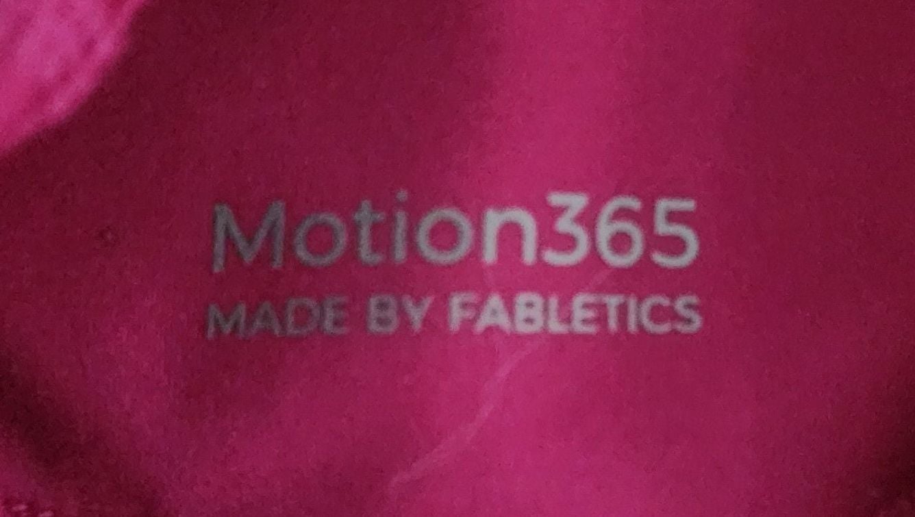Fabletics High-Waisted Twist Back Leggings in Hot Pink 9