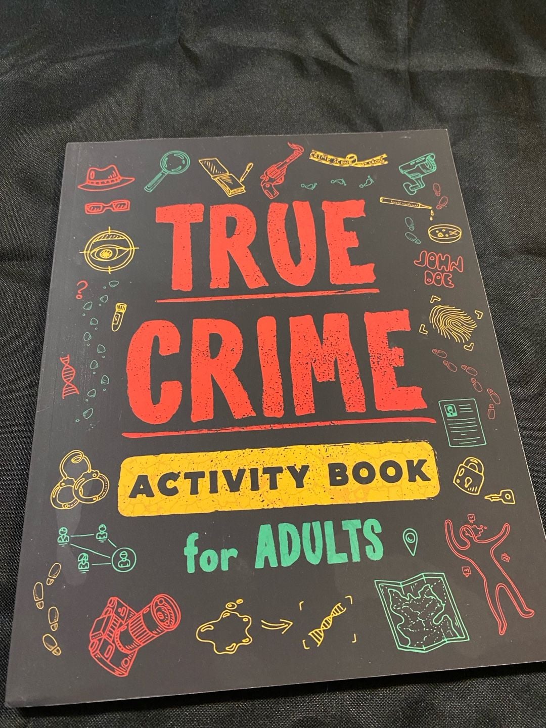 The True Crime Activity Book for Adults by Olivia Lanae 1