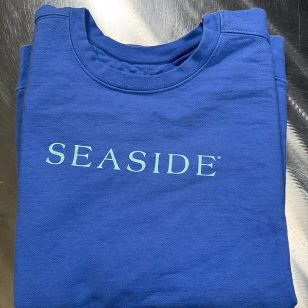 The Seaside Style Blue Crewneck Sweatshirt The New Town The Old Ways Graphic