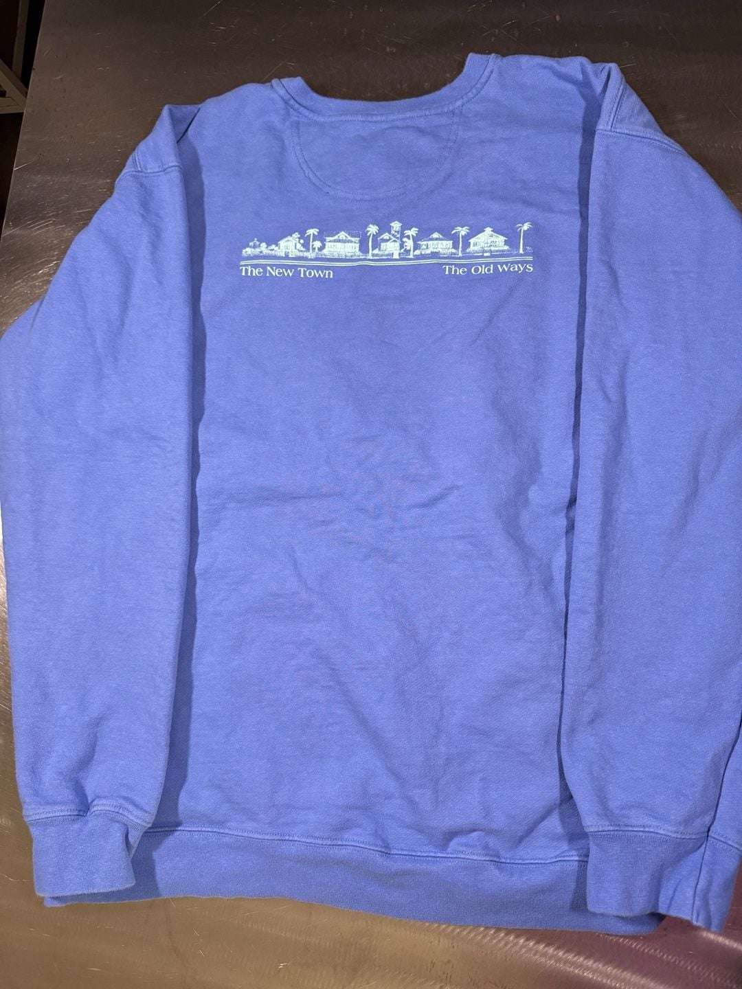 The Seaside Style Blue Crewneck Sweatshirt The New Town The Old Ways Graphic 6