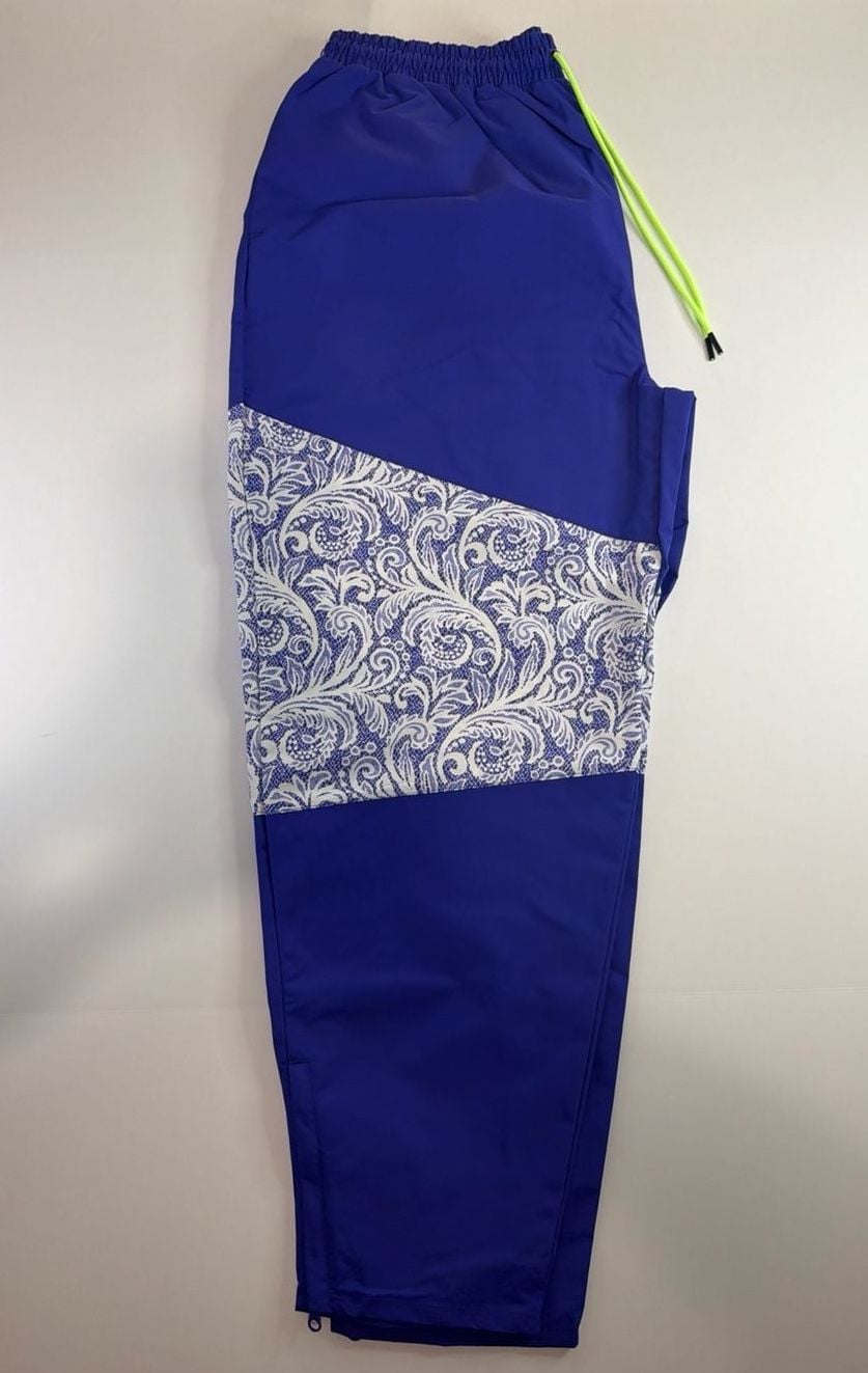 Nike Women's Sportswear Lapis Blue Paisley Lace Inset Track Pants DR6702-430 fit on men’s size Large. 4