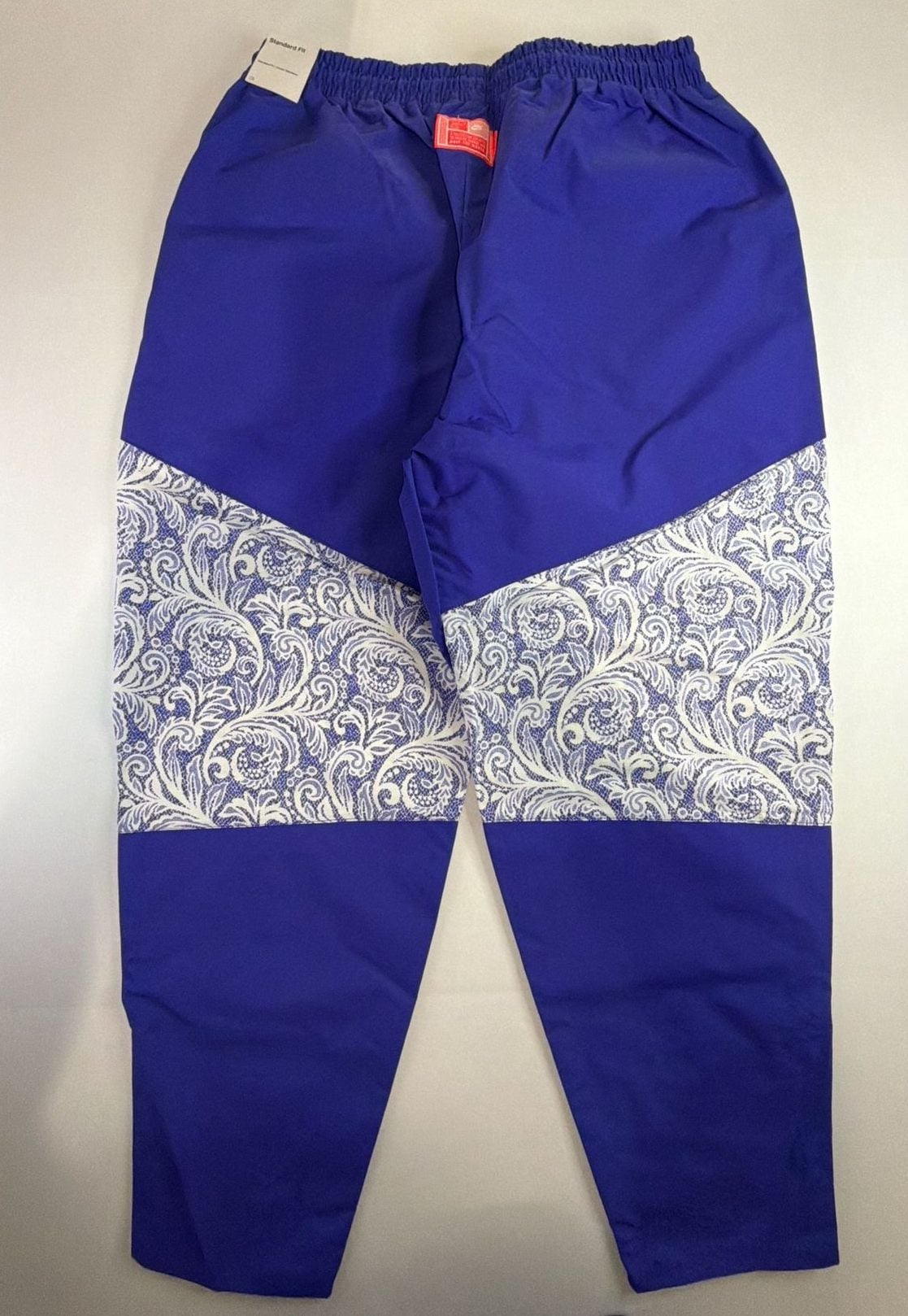 Nike Women's Sportswear Lapis Blue Paisley Lace Inset Track Pants DR6702-430 fit on men’s size Large. 5