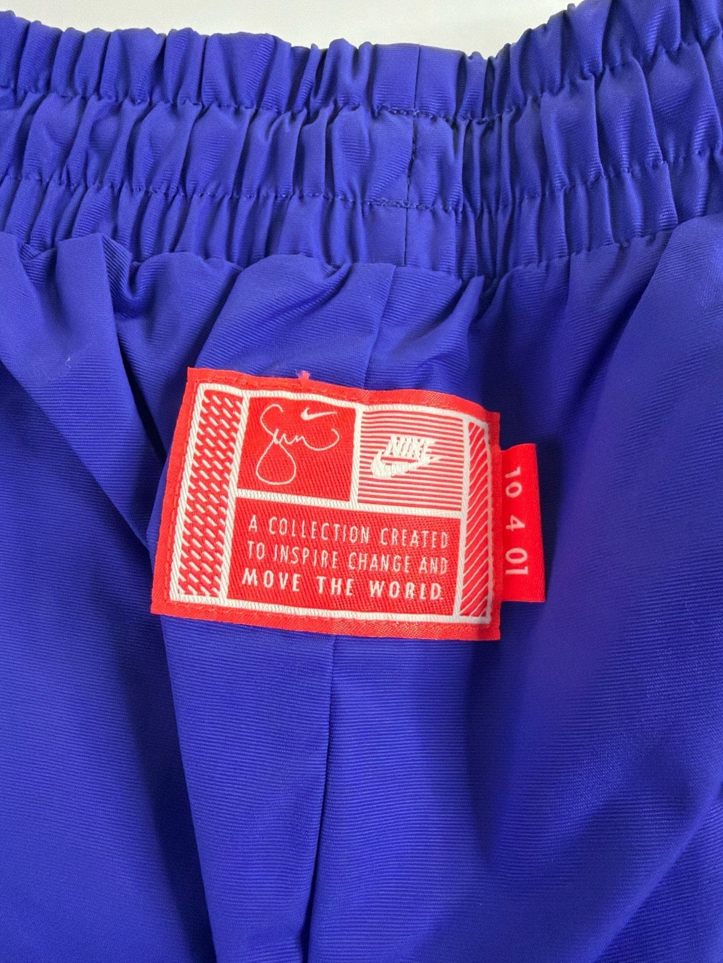 Nike Women's Sportswear Lapis Blue Paisley Lace Inset Track Pants DR6702-430 fit on men’s size Large. 6