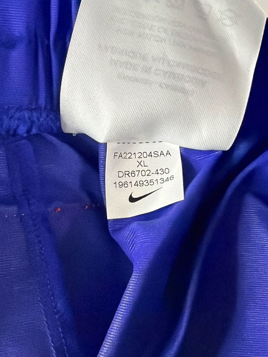 Nike Women's Sportswear Lapis Blue Paisley Lace Inset Track Pants DR6702-430 fit on men’s size Large. 10