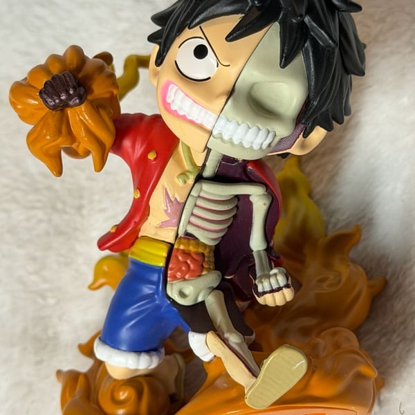 Mighty Jaxx Freeny's Hidden Dissectibles x One Piece Monkey D. Luffy Red Hawk