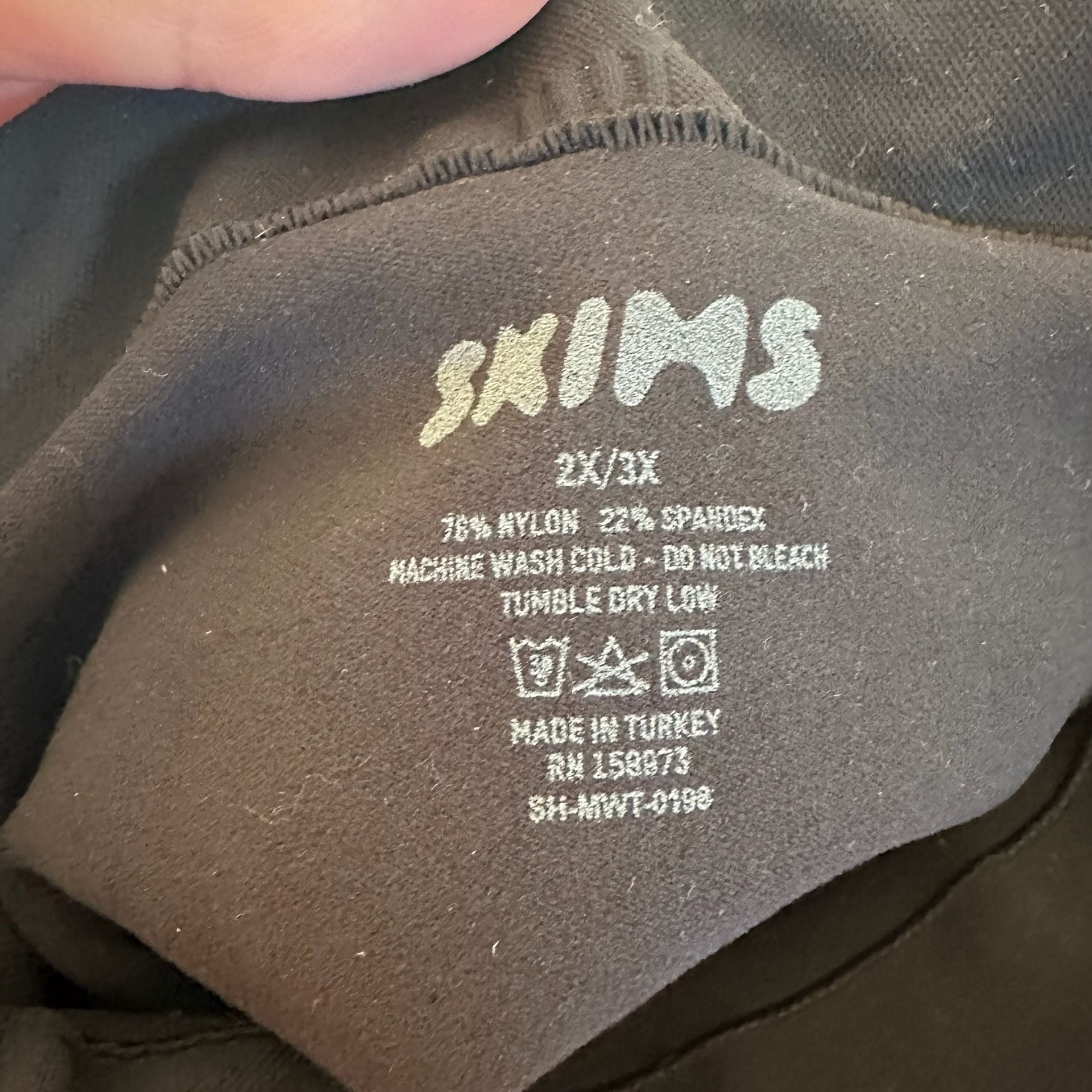 SKIMS Everyday Sculpt High Waisted Thong in Onyx 3