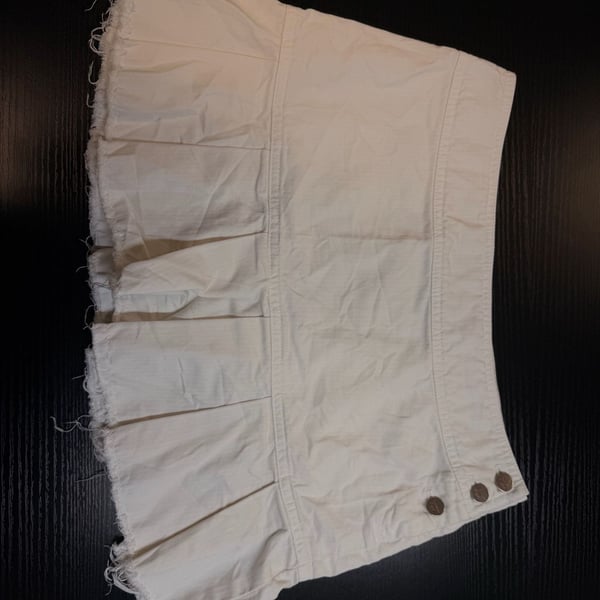 American Eagle Outfitters White Denim Pleated Mini Skirt with Raw Hem