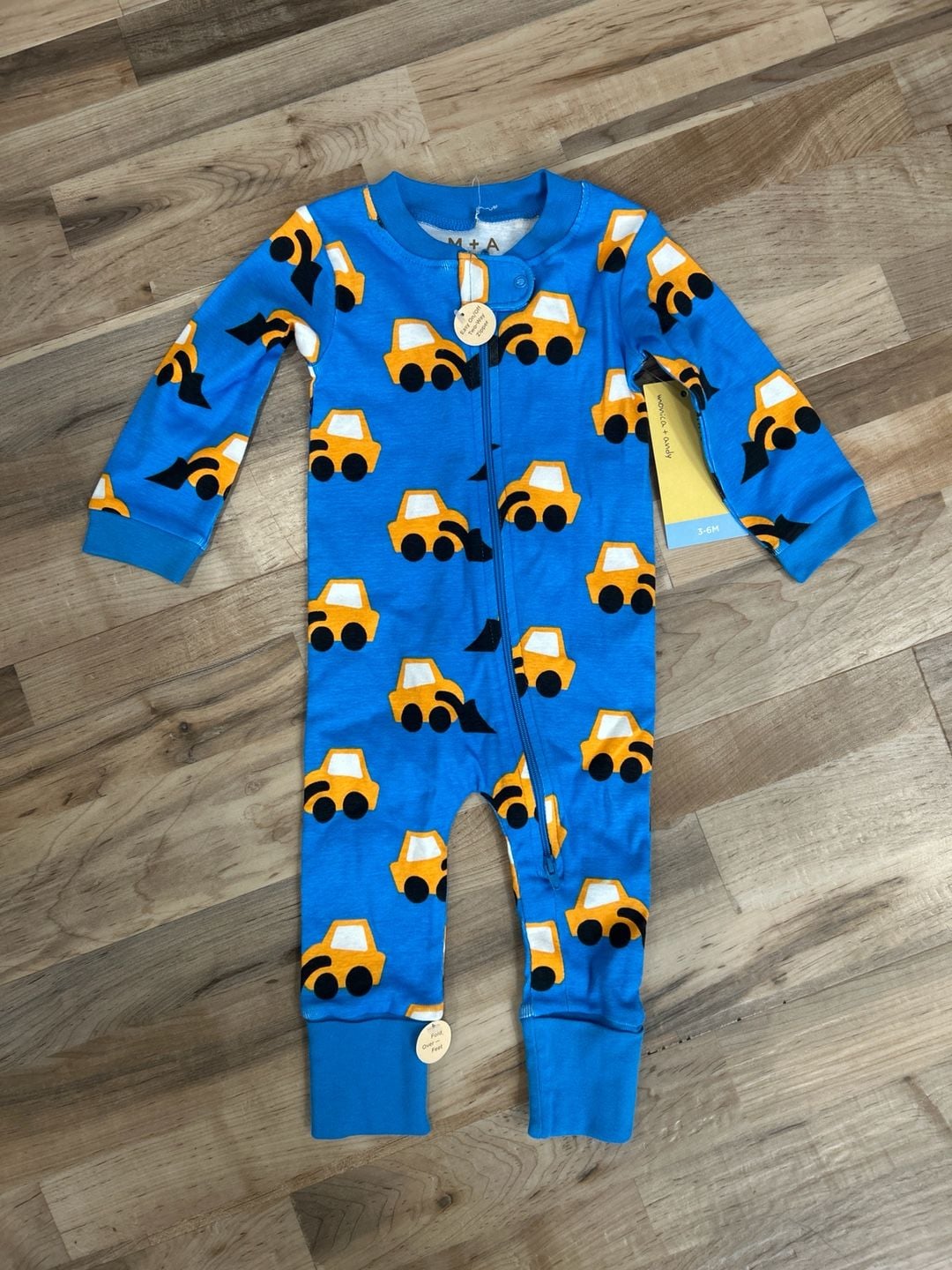 Monica + Andy Organic Cotton Two-Way Zip Romper in Construction Trucks 2