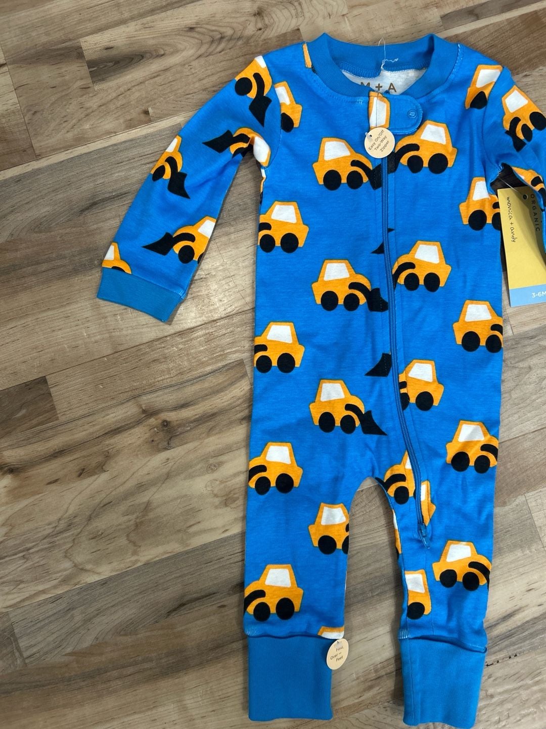 Monica + Andy Organic Cotton Two-Way Zip Romper in Construction Trucks 3
