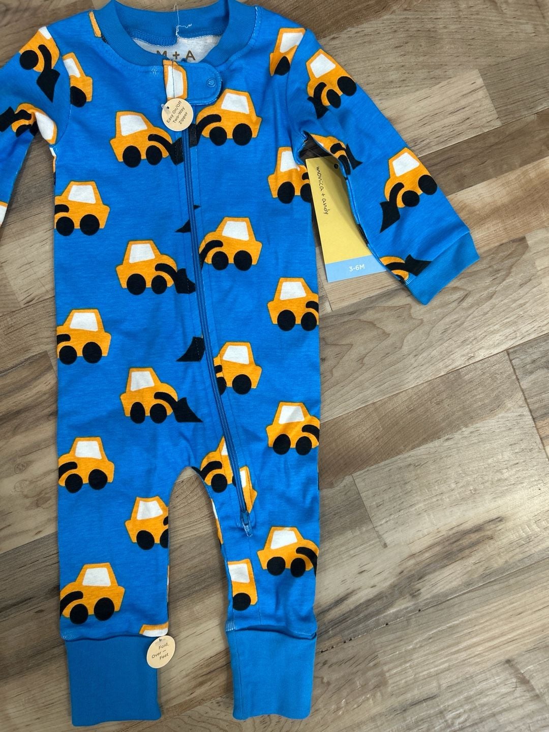 Monica + Andy Organic Cotton Two-Way Zip Romper in Construction Trucks 4