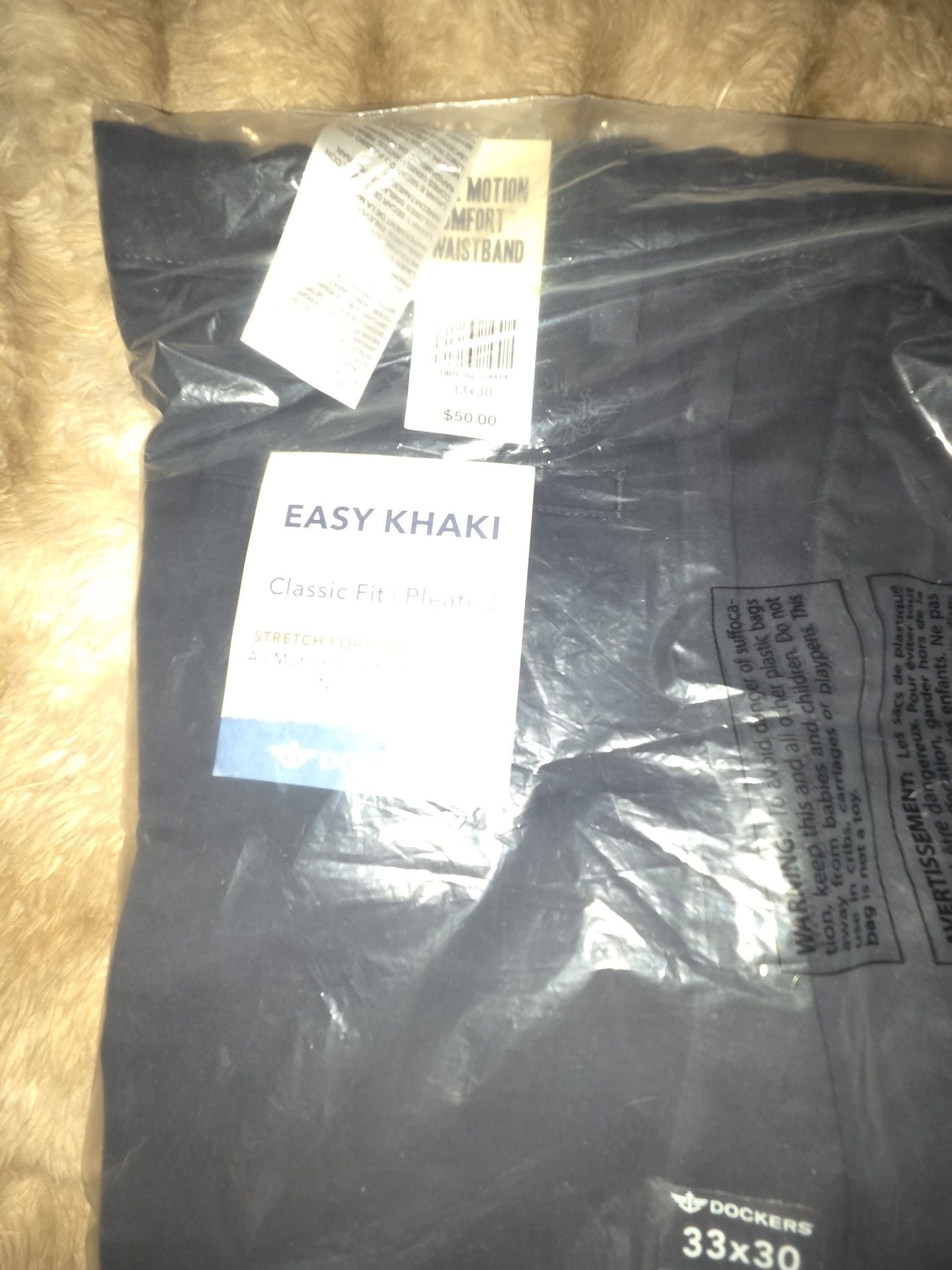 Dockers Easy Khaki Classic Fit Pleated Pants 33x30.
*Average price is $38 on sellraze (see pic) 2