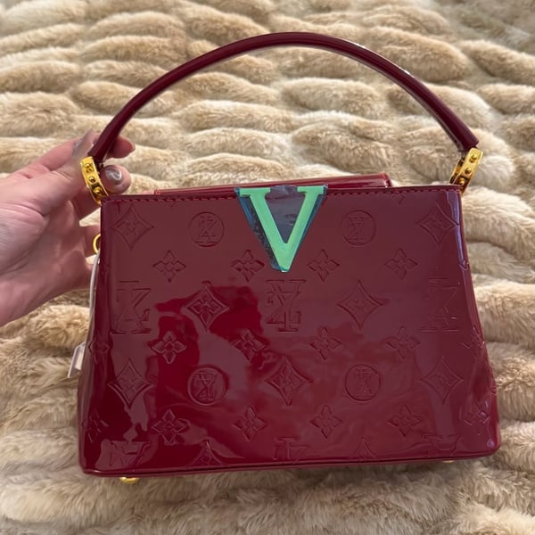 Twist PM Monogram Vernis style Handbag
