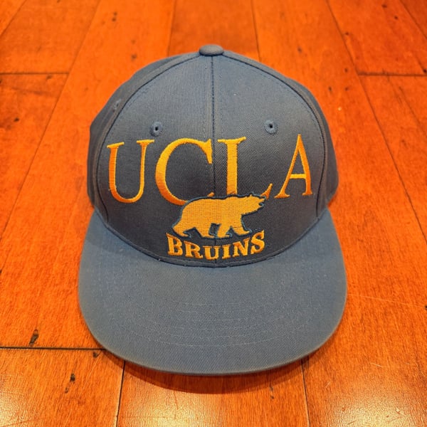Vintage faded UCLA Bruins Embroidered Logo Baseball Cap Hat Blue Gold