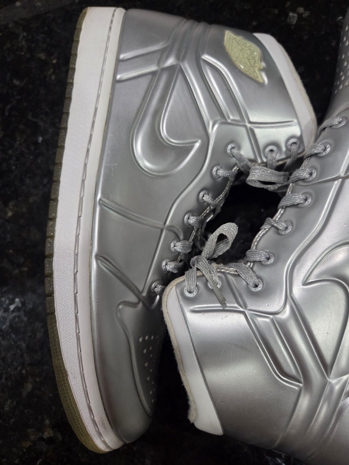 Iconic Air Jordan 1 Special Edition "Anodized Silver" Sneakers in Metallic Silver/Platinum. Men Size 10.

*$480 on novelship.com (see pic)* 7