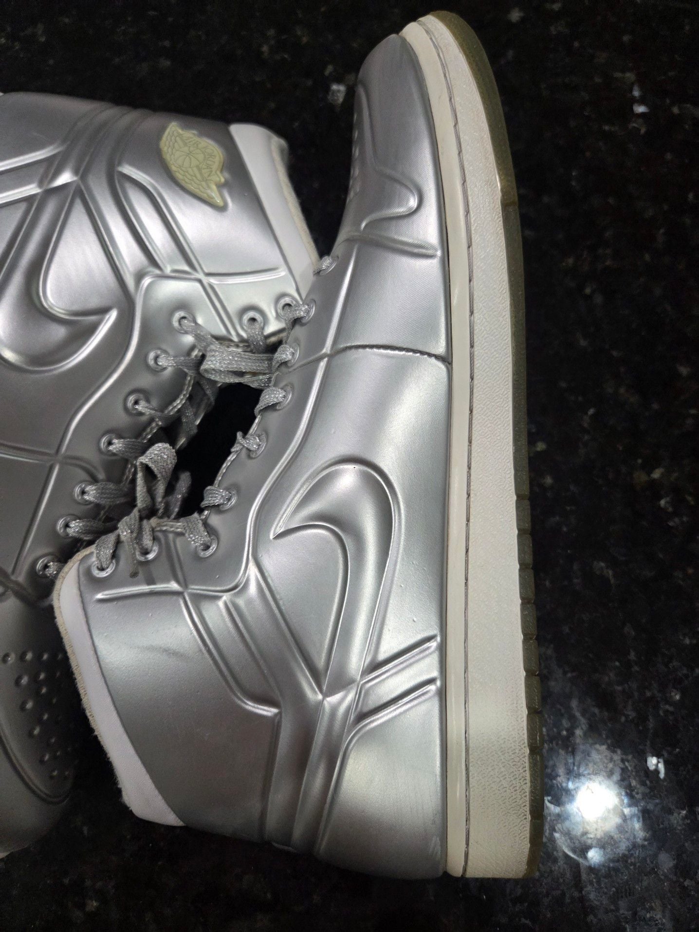Iconic Air Jordan 1 Special Edition "Anodized Silver" Sneakers in Metallic Silver/Platinum. Men Size 10.

*$480 on novelship.com (see pic)* 8