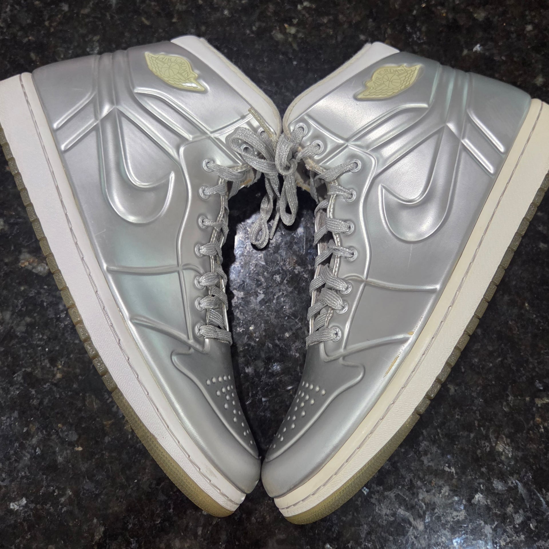 Iconic Air Jordan 1 Special Edition "Anodized Silver" Sneakers in Metallic Silver/Platinum. Men Size 10.

*$480 on novelship.com (see pic)* 10