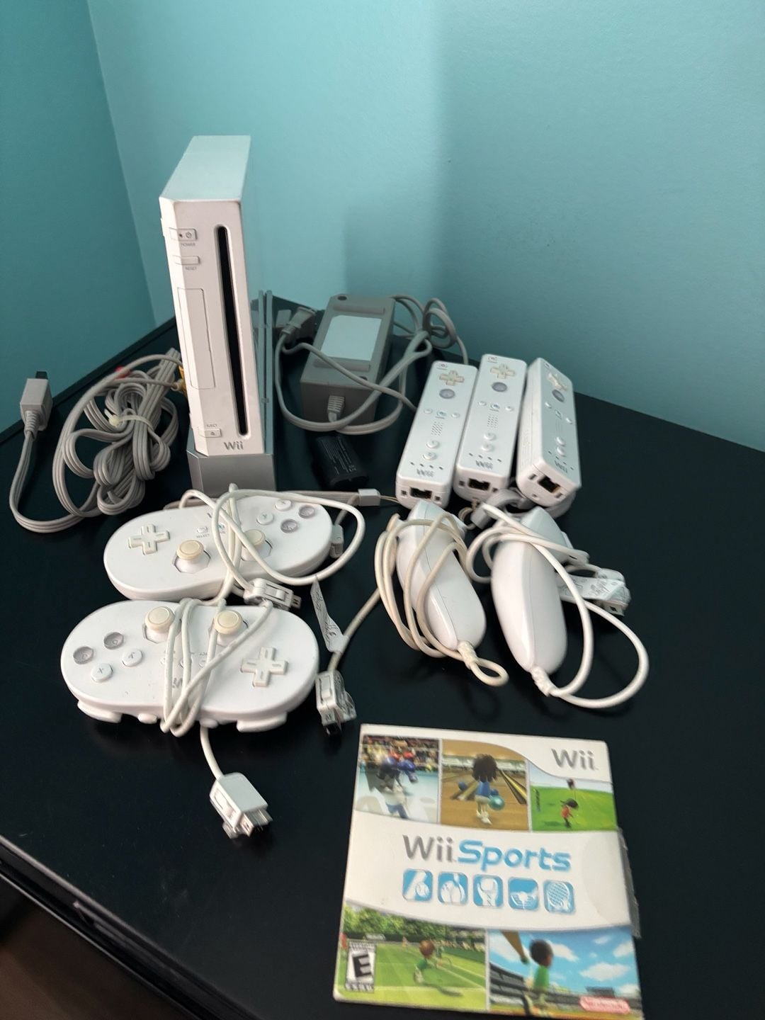 Nintendo Wii Console Bundle with extra handles and Wii Sports pack and Active Life Outdoor Challenge in good condition 1