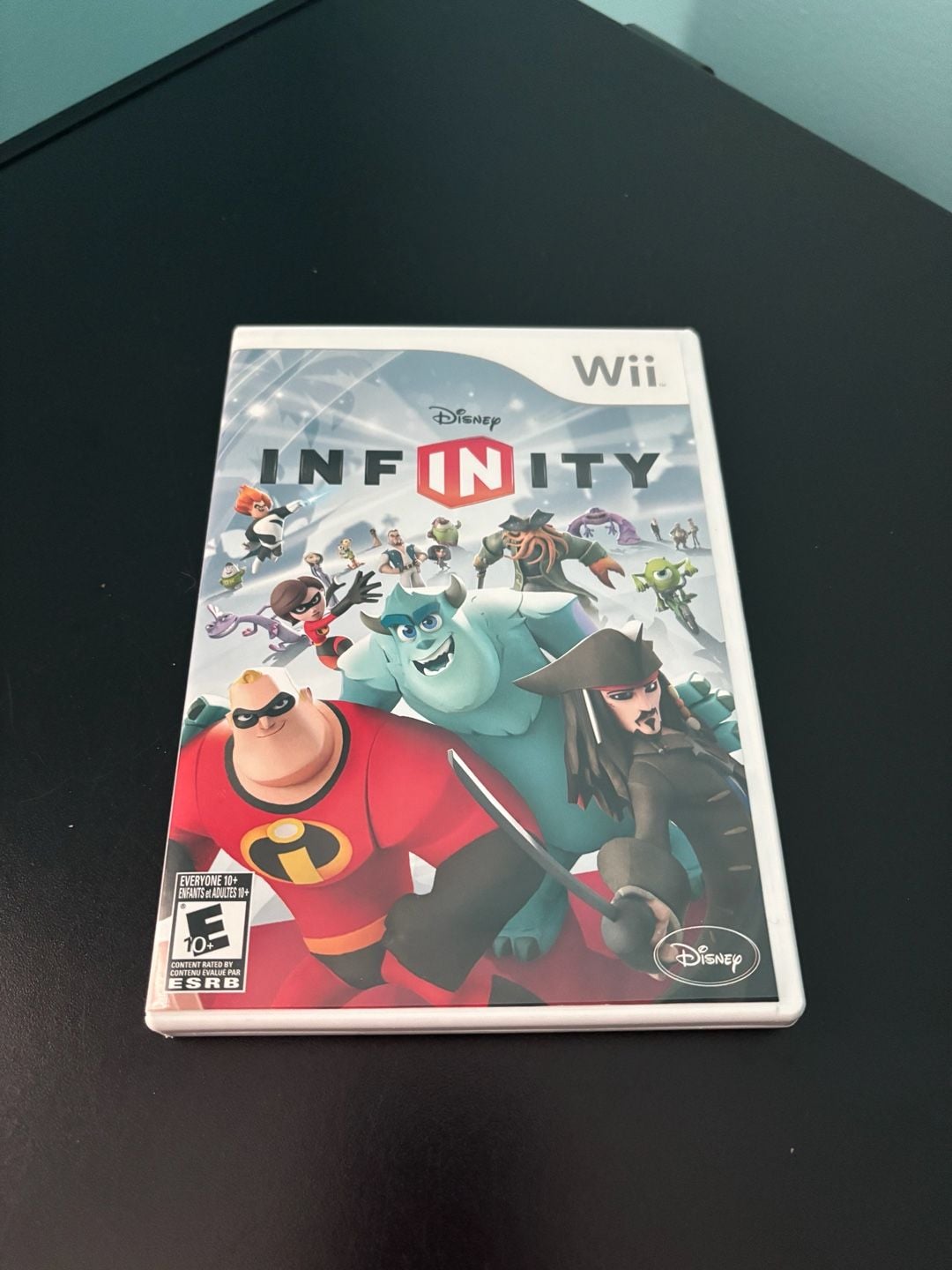 Disney Infinity Lot with Base, 10 Figures (Elsa, Anna, Jack Sparrow, Merida), Play Set Piece, and Power Disc and Disney game to play with characters in good condition 3
