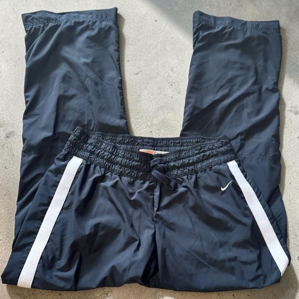 Nike The Athletic Dept. Youth Track Pants Black Size L (12-14) can fit a Small Women 