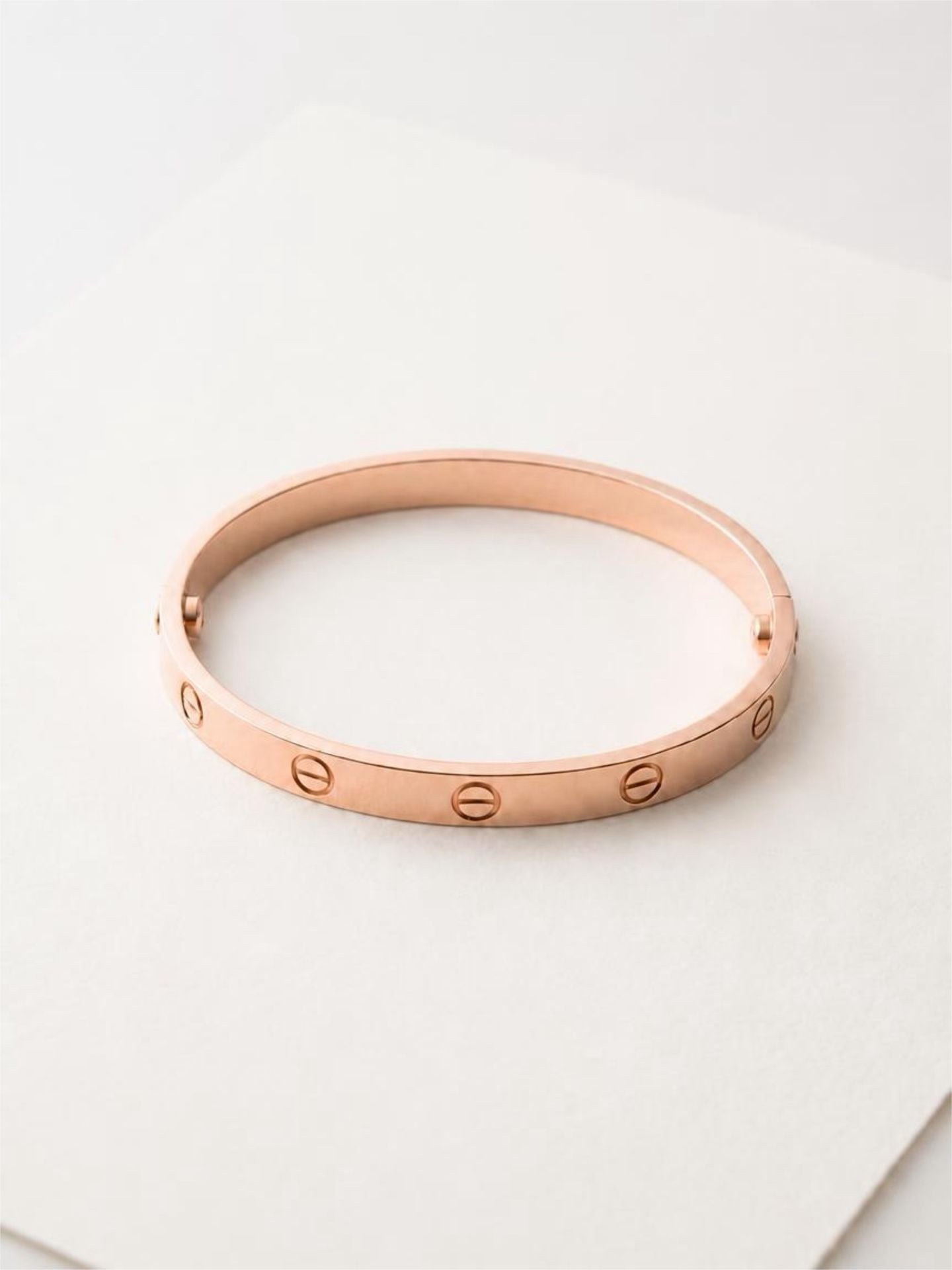 Rosegold clip on fashion screw motif bangle 1