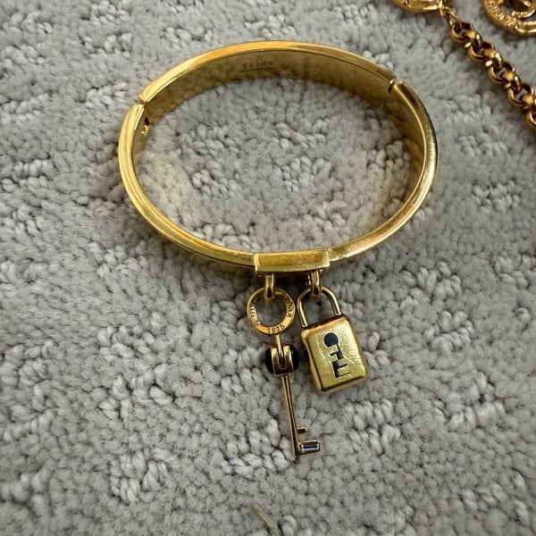 Fendi Gold Tone Lock and Key Charm Bangle Bracelet
