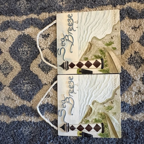 Set of 2 Kate McRostie Sea Breeze Cape Lookout Lighthouse Nautical Wall Plaques