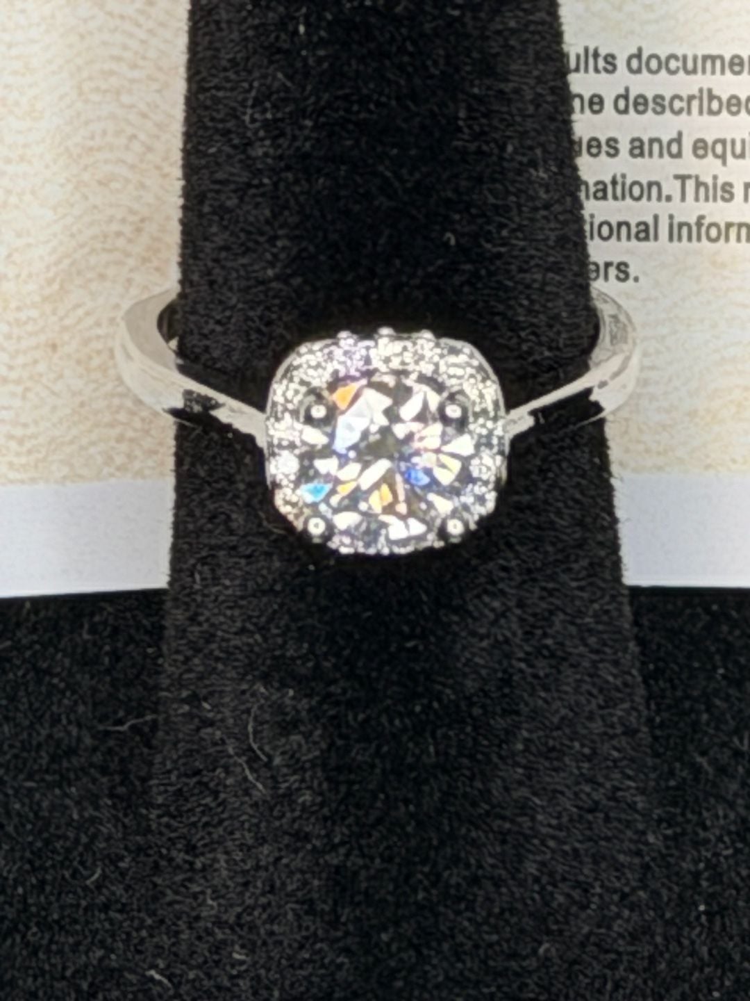 18K White Gold Plated Moissanite Halo Ring. Features a stunning 1.0ct 3