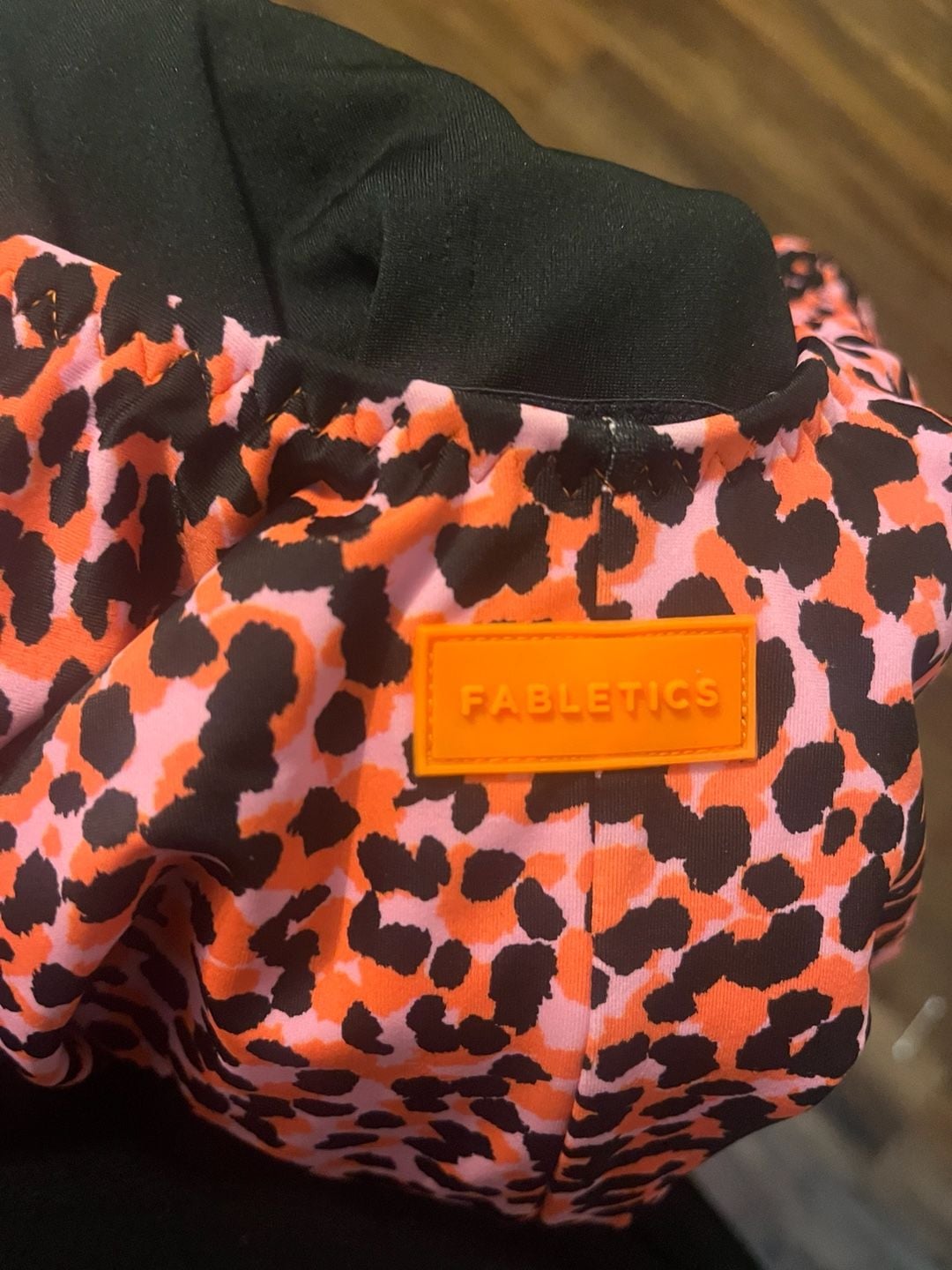 Fabletics Scoop Tie Back One-Piece Swimsuit in Flash Orange Safari Spots 4