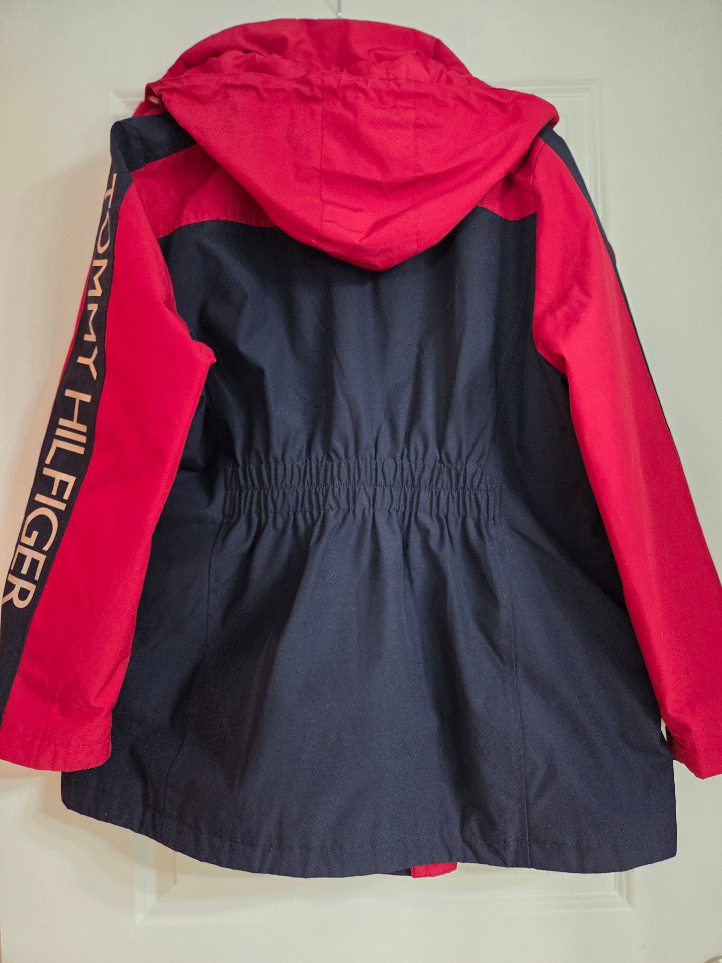 Tommy Hilfiger Women's 3-in-1 All Weather System Jacket in Red and Navy. Adjustable hood and hand cuffs, 2 zipper pockets and 2 zip-up sizes (see pic). 9