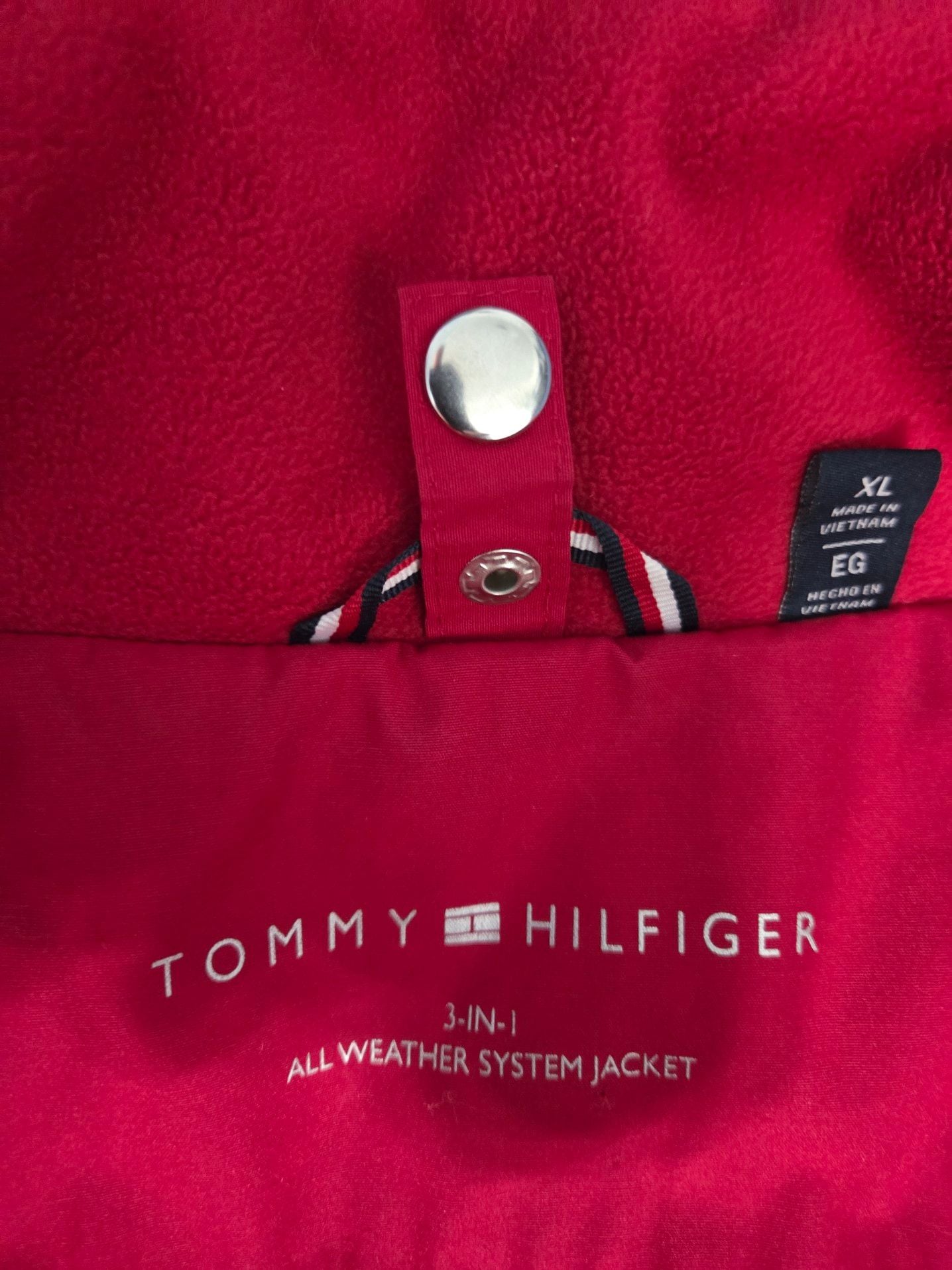Tommy Hilfiger Women's 3-in-1 All Weather System Jacket in Red and Navy. Adjustable hood and hand cuffs, 2 zipper pockets and 2 zip-up sizes (see pic). 10