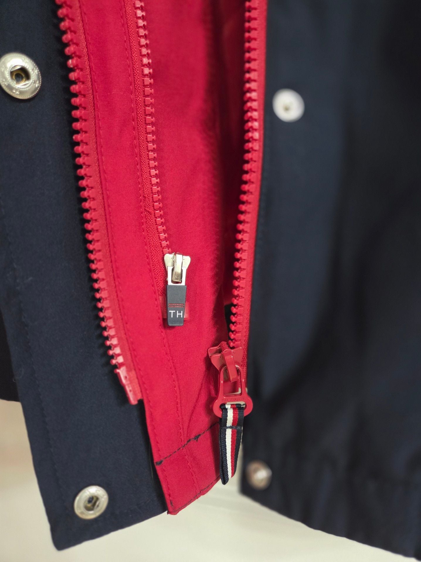 Tommy Hilfiger Women's 3-in-1 All Weather System Jacket in Red and Navy. Adjustable hood and hand cuffs, 2 zipper pockets and 2 zip-up sizes (see pic). 11