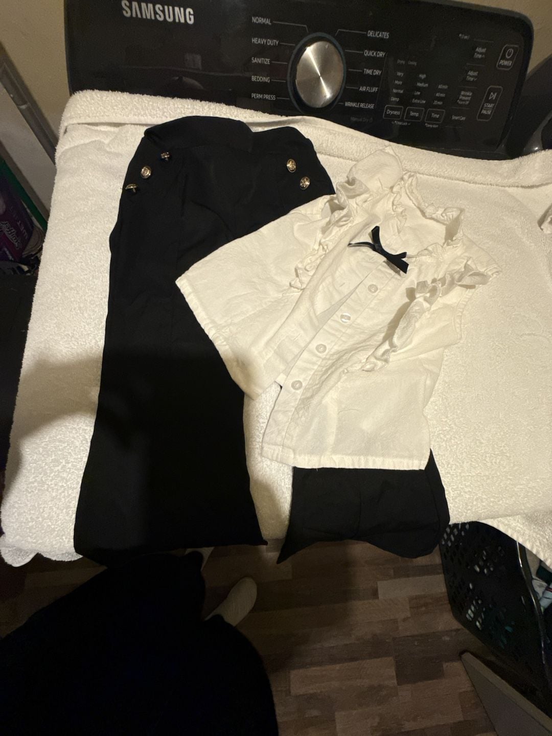 Black and White Two-Piece Ruffled Bow-Tie Blouse and Gold Button Flared Pants Set 1