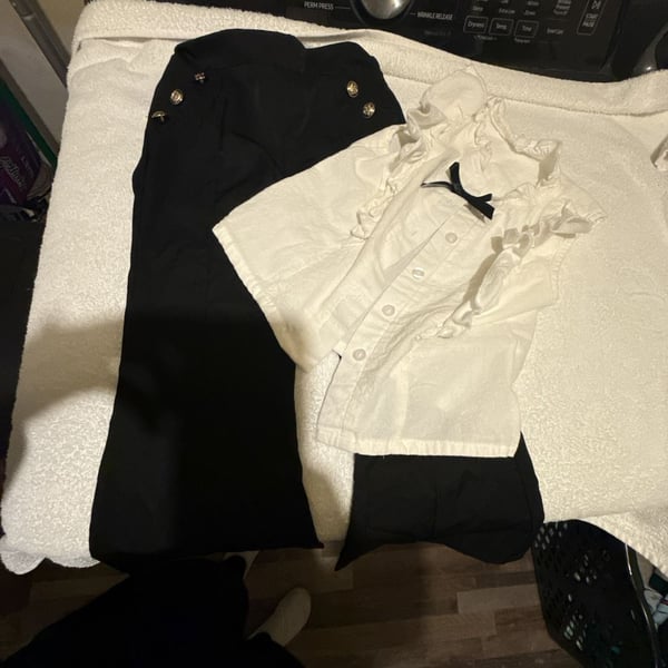 Black and White Two-Piece Ruffled Bow-Tie Blouse and Gold Button Flared Pants Set