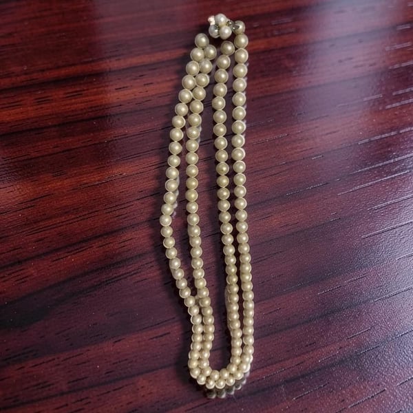 Vintage Multi-Strand Faux Pearl Bracelet with Jeweled Floral Clasp